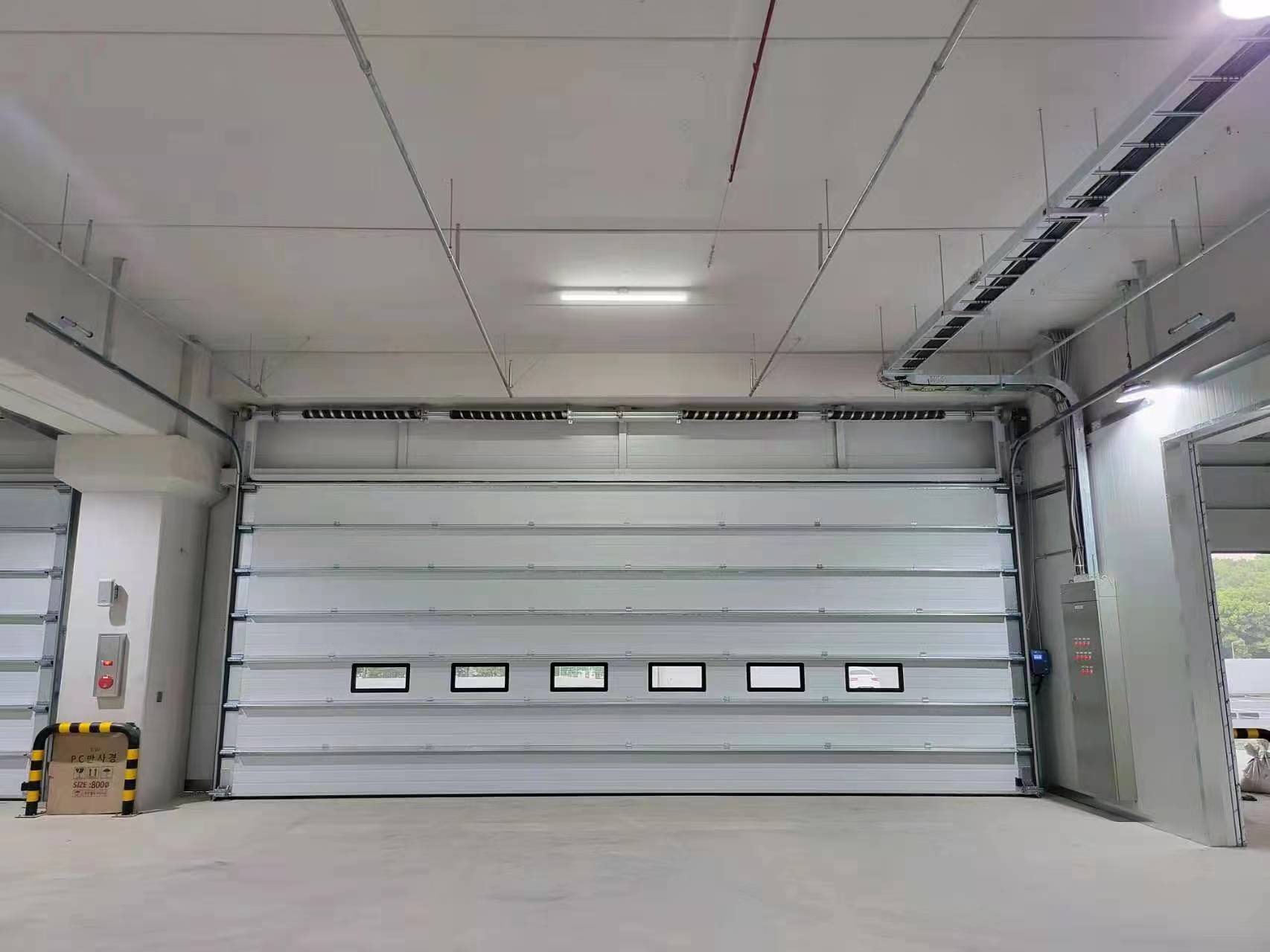 ¿Por qué una puerta seccional puede solucionar algo más que los problemas de acceso?